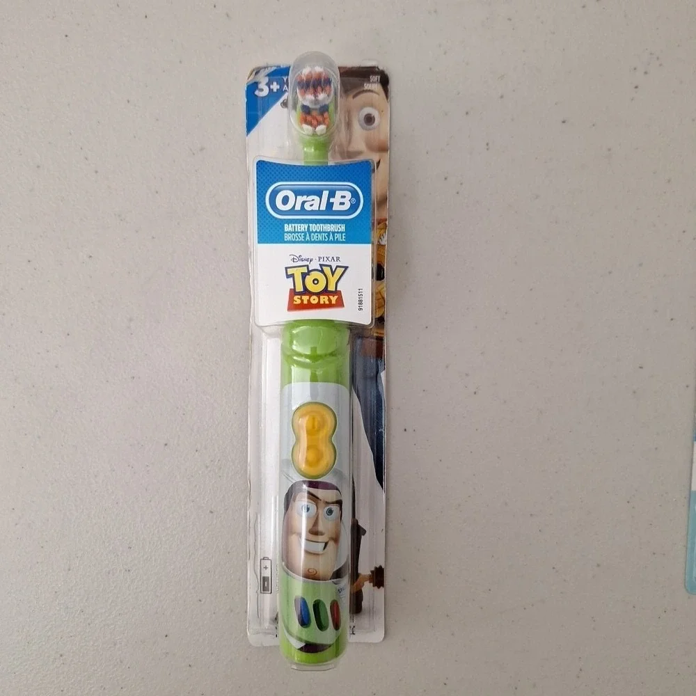 Oral B Battery Toothbrush Disney Toy Story & Oral B Manual Pooh Toothbrush NEW